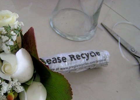bouquet-wrap Under the fancy ribbon wrap is a message
